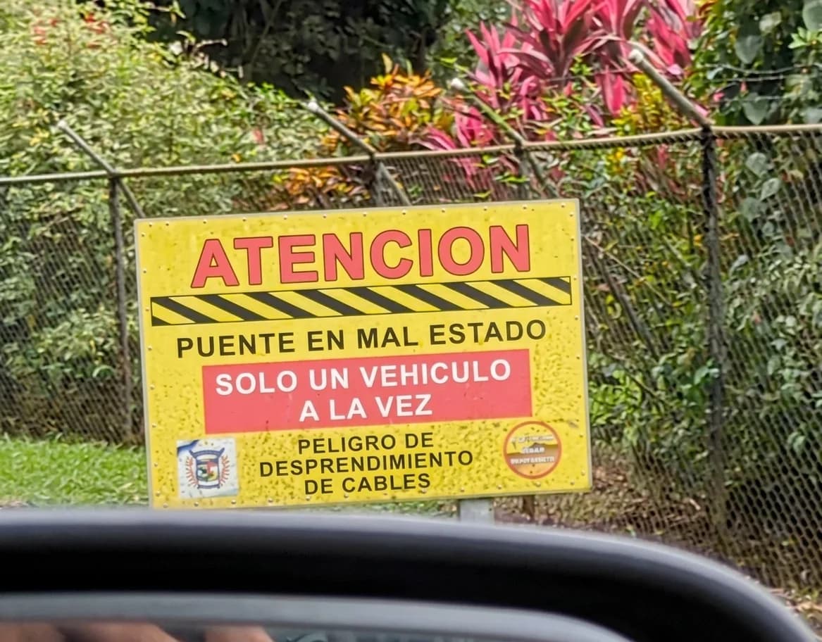 Danger of bridge collapsing sign in Costa Rica